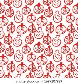 Pomegranate seamless pattern in red and white colors. Floral vector illustration of abstract doodle and scandinavian fruits. Garnet armenian pattern. The elegant the template for fashion prints.