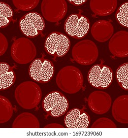 Pomegranate vector seamless pattern on dark background.Fruit bright pattern in the style of hand drawing.Cartoon pomegranate  background.Vector tropical fruit background.Flat vector stock illustration