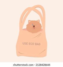 Pomeranian spitz in a tote bag.Say no to plastic Zero waste image concept.