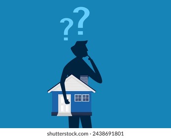 Ponder about the house. man holding house thinking about real estate investment 