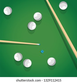 Pool stick and balls on green billiard table while game. Biliard balls and cue for pool game on green table top view