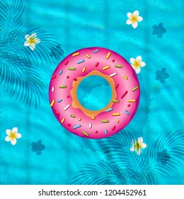 pool top view,  inflatable swim ring in shape of donut in the pool 