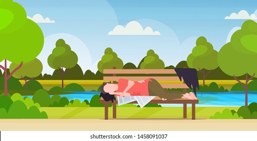 poor man sleeping outdoor drunk beggar lying on wooden bench homeless jobless concept urban park landscape background horizontal full length