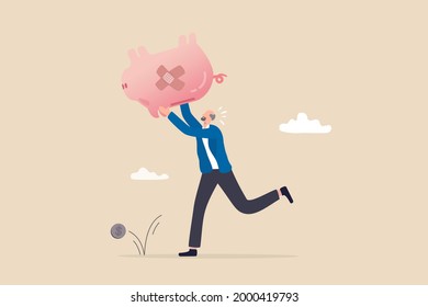 Poor retiree old man, broke losing all pension or retirement funds, financial problem, poverty or bankruptcy after retired concept, depressed worried old man shaking piggybank pension with no money.