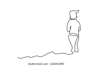 poor unhappy boy outside  looking forward back view