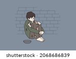 Poor unhappy small boy begging on street with empty bowl. Upset little homeless kid hungry sad ask for help or food outdoors. Poverty, children beggar concept. Vector illustration. Cartoon character. 