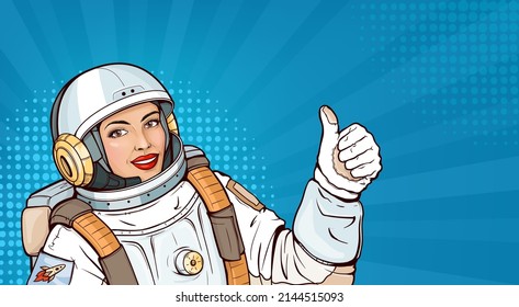 Pop art astronaut girl in space suit showing thumb up or like gesture. Smiling woman cosmonaut in helmet and uniform for exploration demonstrating approval sign on blue halftone background.