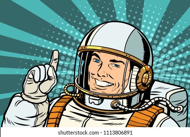 pop art astronaut points up. retro vector illustration kitsch vintage drawing