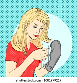 pop art background, point. Young, the girl sews mens black socks with a needle and thread. Imitation comic style, retro, vector illustration