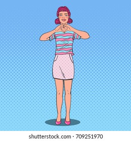 Pop Art Beautiful Woman Showing Heart Hand Sign. Love Comic Style Background. Vector illustration