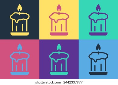 Pop art Burning candle in candlestick icon isolated on color background. Old fashioned lit candle. Cylindrical candle stick with burning flame.  Vector