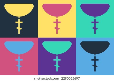 Pop art Christian cross on chain icon isolated on color background. Church cross.  Vector