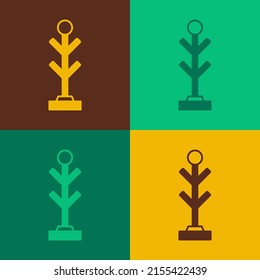 Pop art Coat stand icon isolated on color background.  Vector