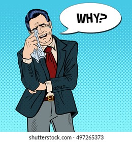 Pop Art Crying Businessman Wipes his Tears with a Handkerchief. Vector illustration