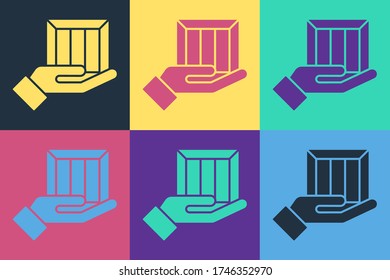 Pop art Delivery hand with cardboard boxes icon isolated on color background. Door to door delivery by courier.  Vector Illustration