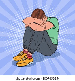 Pop Art Depressed Young Man Sitting on the Floor with Hands on the Head. Depression and Frustration. Vector illustration