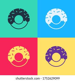 Pop art Donut with sweet glaze icon isolated on color background.  Vector