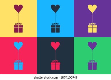 Pop art Gift with balloon in shape of heart icon isolated on color background. Valentine's day, wedding, birthday card. Vector.