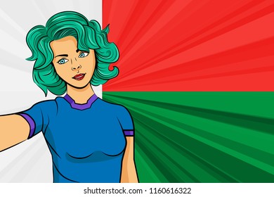 Pop art girl with unicorn color hair style. Young fan girl makes selfie before the national flag of Madagascar. Vector sport illustration in retro comic style