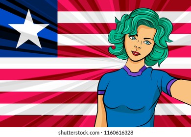 Pop art girl with unicorn color hair style. Young fan girl makes selfie before the national flag of Liberia. Vector sport illustration in retro comic style