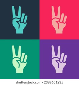 Pop art Hand showing two finger icon isolated on color background. Hand gesture V sign for victory or peace.  Vector