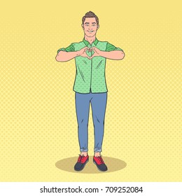 Pop Art Handsome Man Showing Heart Hand Sign. Love Gesture Comic Style Background. Vector illustration
