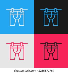 Línea de arte pop Icono de ropa de secado aislado en el fondo del color. Camiseta limpia. Lávese la ropa en una cuerda con espinas de tela. Cuidado de la ropa y limpieza.  Vector