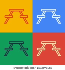 Pop art line Picnic table with benches on either side of the table icon isolated on color background.  Vector Illustration