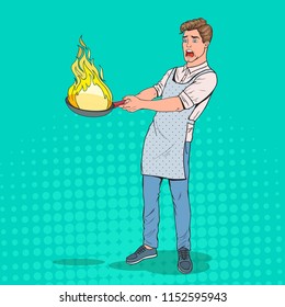 Pop Art Man in the Kitchen Holding Pan. Afraid Young Guy in Apron Cooking with Burning Pan. Vector illustration