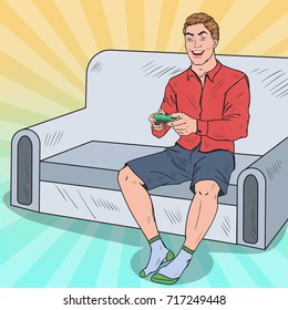Pop Art Man Playing Video Game on a Console. Computer Gaming. Vector illustration