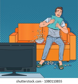 Pop Art Man Watching a Horror Movie at Home. Terrified Guy Watch Film on the Couch with Popcorn. Vector illustration