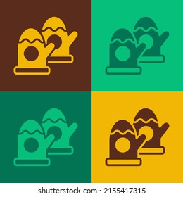Pop art Pair of knitted christmas mittens icon isolated on color background. Mitten icon. Merry Christmas and Happy New Year.  Vector
