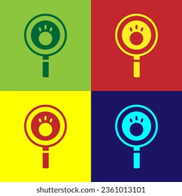 Pop art Paw search icon isolated on color background. Magnifying glass with animal footprints.  Vector