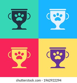 Pop art Pet award symbol icon isolated on color background. Medal with dog footprint as pets exhibition winner concept.  Vector