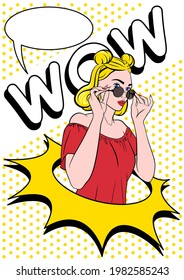 Pop art retro comic style poster of a beautiful surprised woman holding sunglasses, coming out of a yellow explosion star, with inscription wow and a text bubble in the background. Vector illustration