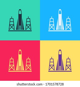 Pop art Rocket launch from the spaceport icon isolated on color background. Launch rocket in space.  Vector Illustration