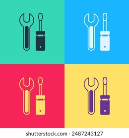 Pop art Screwdriver and wrench spanner tools icon isolated on color background. Service tool symbol.  Vector