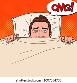 Pop Art Shocked Man Hiding in Bed. Scared Guy Peeps Up Under the Blanket. Vector illustration