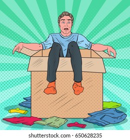 Pop Art Stressed Man in the Box with Clothes. Guy Moving with the  Boxes to new House. Vector illustration