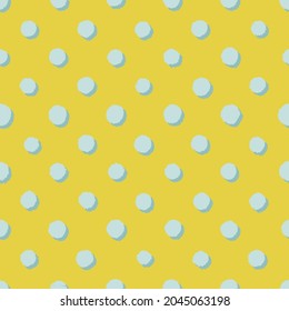 Pop art textured polka dot seamless pattern for textile, fabric, wrapping paper, wallpaper and other print and design. 3d blue spots on yellow background. Vector hand-drawn illustration. 