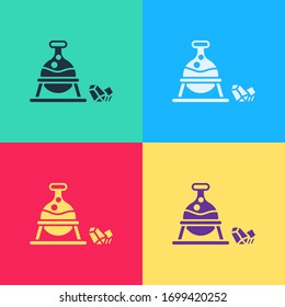 Cauldrón de arte pop y icono de piedra mágica aislado en el fondo de color. Ilustración vectorial
