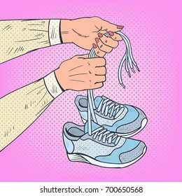 Pop Art Woman Hands Holding Running Shoes. Sneakers Footwear. Vector illustration