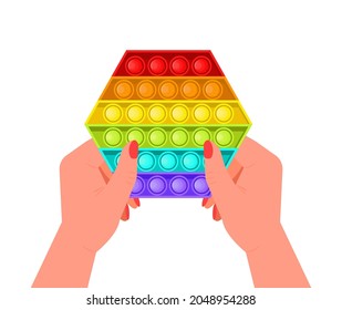 Pop it fidget, antiestresor vector de juguete en estilo plano. Juegos sensoriales de moda. Juguete de mano colorido para los niños, empujar burbujas para disfrutar. Juego anti estrés infantil. Manos de niños sosteniendo burbujas de silicona 