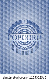 Popcorn blue emblem with geometric pattern background.