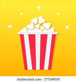 Popcorn box. Movie Cinema icon in flat design style. Pop corn icon. Yellow gradient background. Shining stars. Flat design. Vector illustration