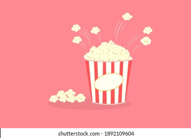 A popcorn box on a pink background