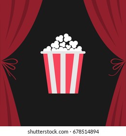 Popcorn box. Open luxury red silk stage theatre curtain. Velvet scarlet curtains with bow. Fast food. Flat design. Movie night cinema premiere icon. Template. Black background. Vector illustration