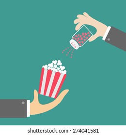 Popcorn. Businessman hand. Salt shacker with hearts. Cinema icon in flat design style. Vector illustration