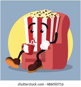 popcorn drinking soda while watching movie