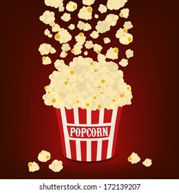 Popcorn falling in the striped popcorn bag vector
